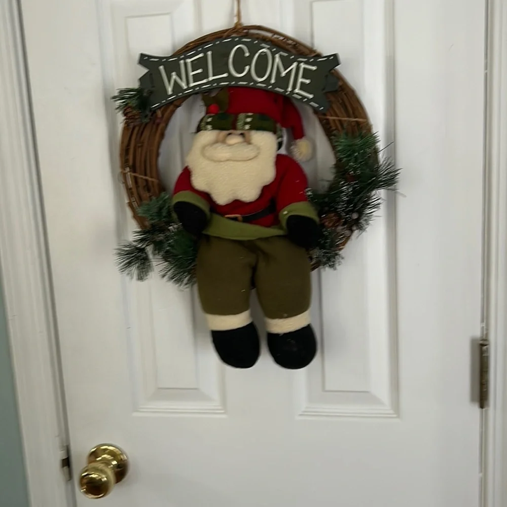 Holiday Santa Christmas wreath. Plush Santa with Pine.